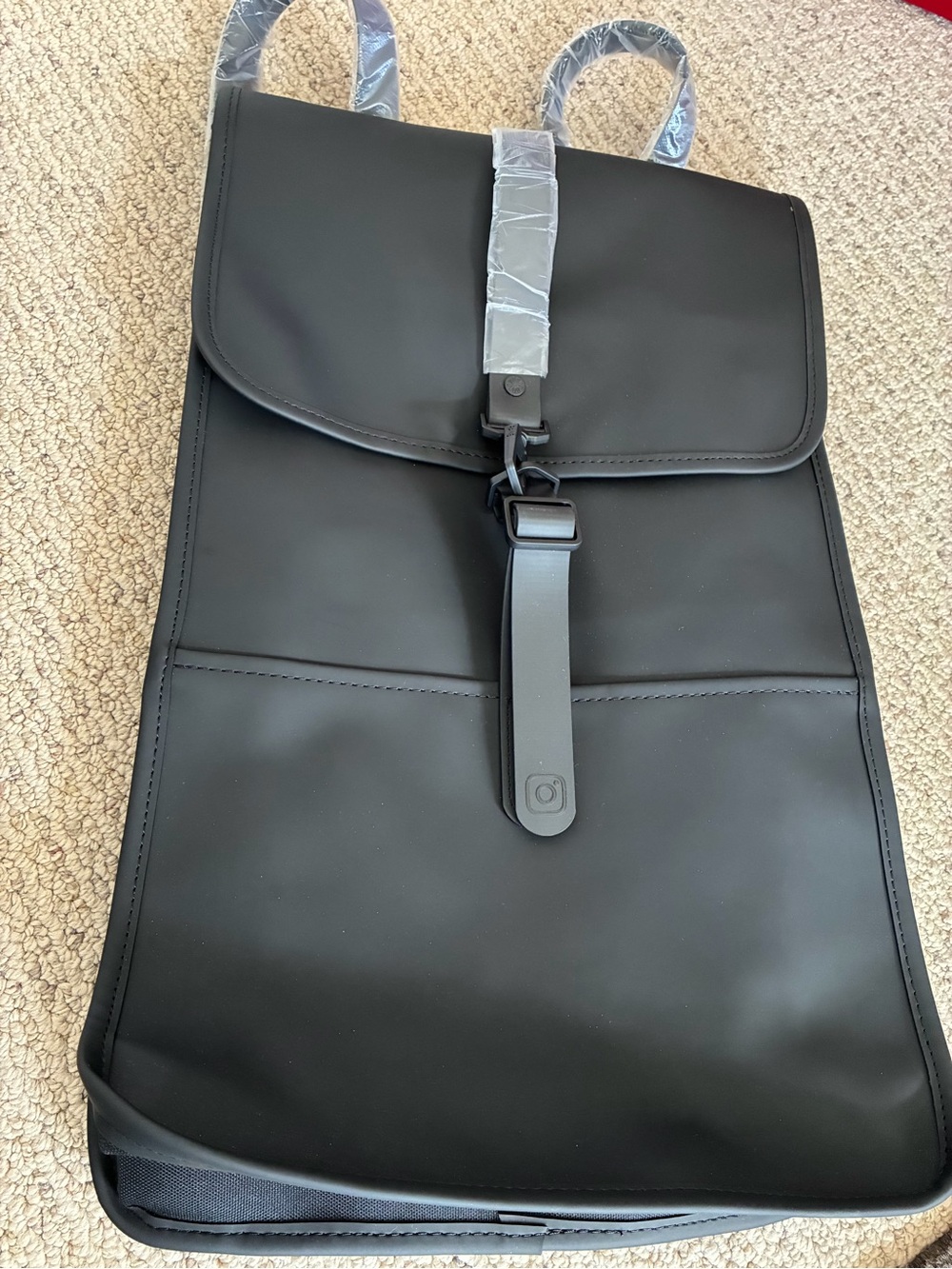 Rains Black Roll-Top Laptop Backpack
